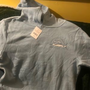 A light blue Crown and Ivy Southern Angler Hoodie still has tags never worn L